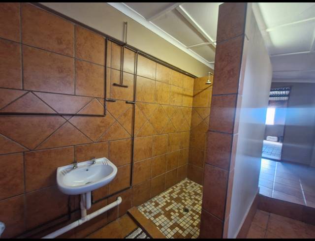 7 BEDROOM GUEST HOUSE FOR SALE IN DIBENG